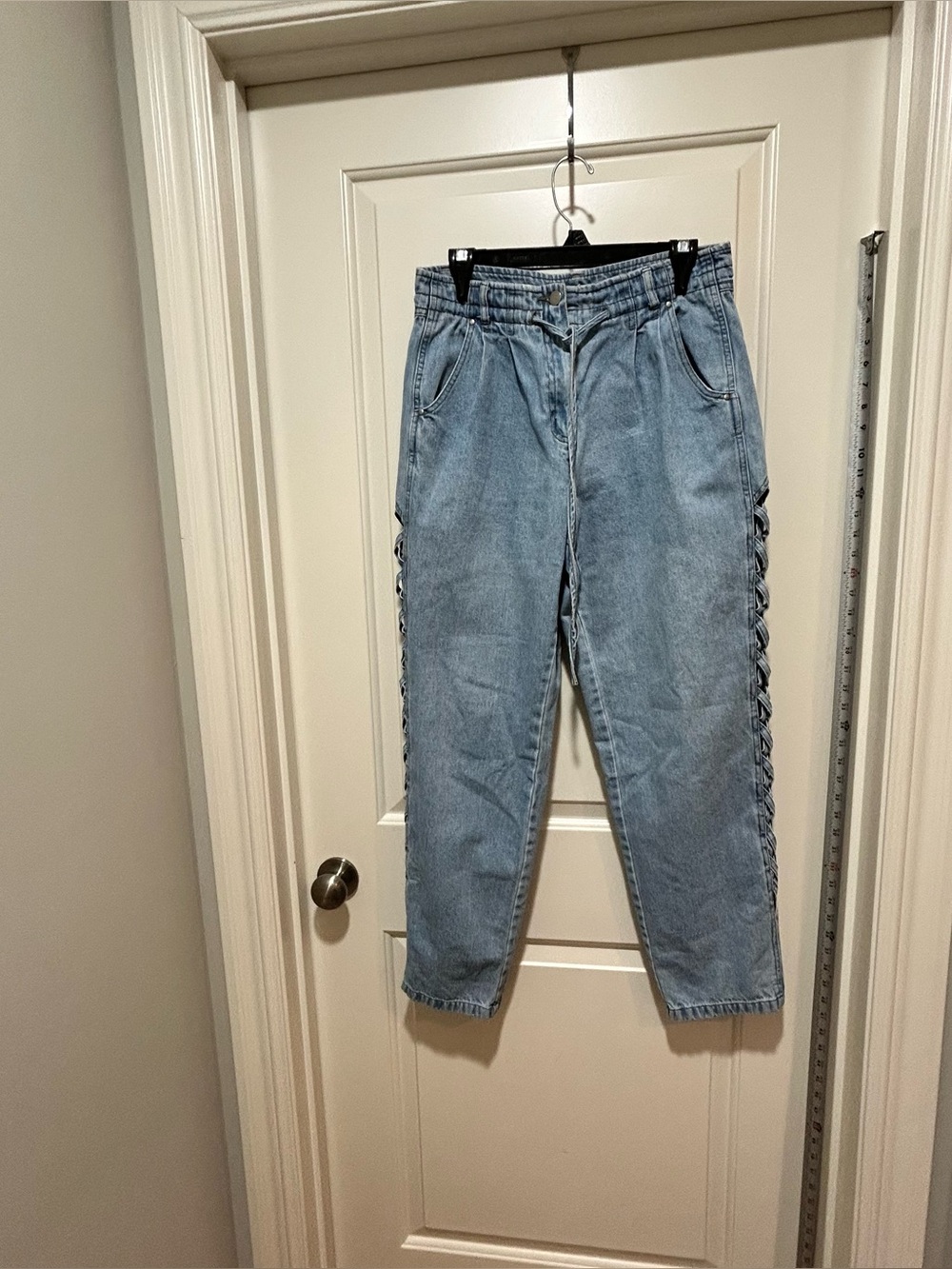 Together brand Light Blue Women’s size 10 Jeans with Side Cutouts Detail.